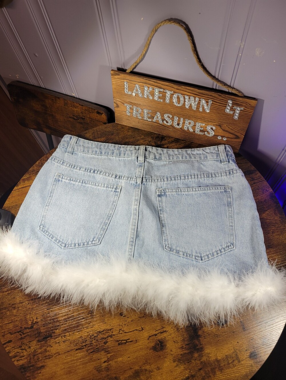 Light Wash Denim Mini Skirt with White Feather Trim